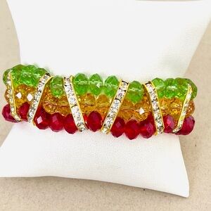 Multi color beaded bracelet gol to flower toggle, NWOT